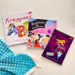 Bilderböckerna Kroppens ABC & Piraterna och förtrollningen på vit träyta med kapitelboken Min pinsamma familj, en sjal syns