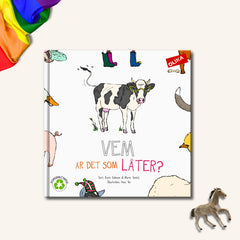 Pekboken Vem är det som låter? på vit yta. I övre hörnet syns en regnbågsflagga, i nedre hörnet en leksakshäst