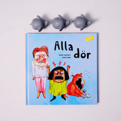 Boken Alla dör ligger på vit yta. Ovanför står tre små grå leksakselefanter
