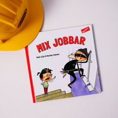  Bilderboken Mix jobbar syns på vit yta tillsammans med en bygghjälm